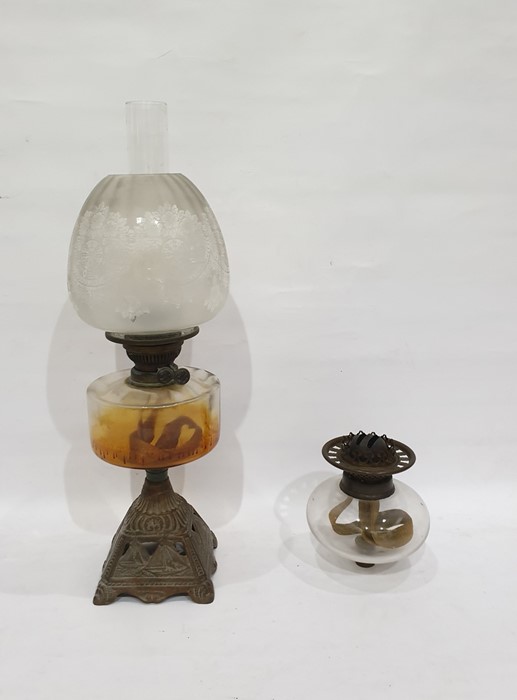 Victorian iron and glass oil lamp, the base pierce