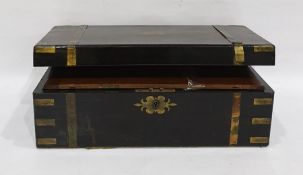 Victorian ebonised writing box of rectangular form with brass mounts, the interior revealing a