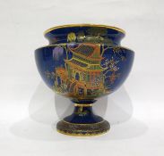 Carltonware pedestal bowl decorated with pagoda scenes, on a blue ground (unmarked), 17cm high