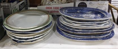 A large quantity of blue and white and other meat plates and serving platters