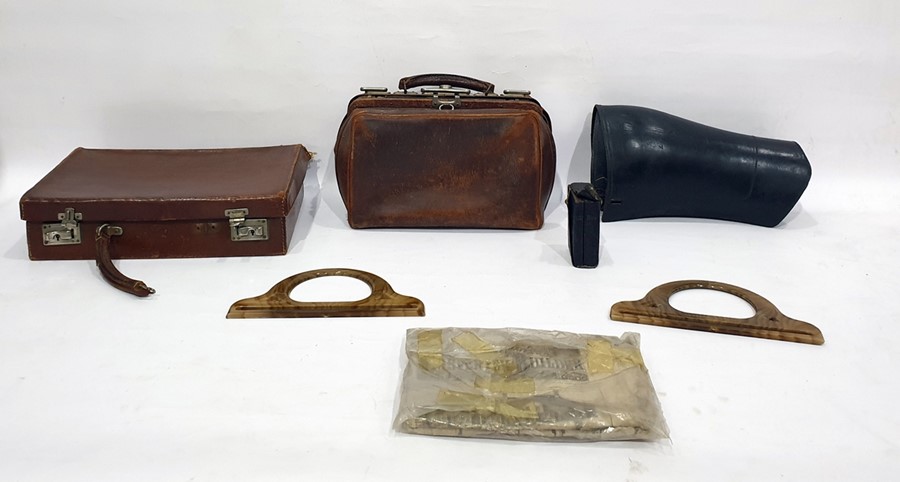 Small Gladstone bag, a pair of bakelite bag handles, "The Illustrated Carpenter and Builder", two