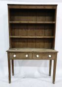 19th century pine dresser with two shelves above two drawers, on rectangular section supports, 130cm