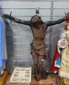 A cast iron figure of Christ of the Cross , 95cms tall