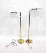 Two modern adjustable reading lamps, polished bras