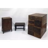 Pair of four-drawer chests, a mahogany single door table-top cupboard and a carved oak stool