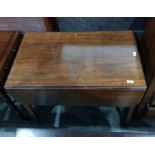 19th century mahogany pembroke table of square section tapering supports to brass caps and