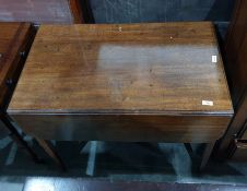 19th century mahogany pembroke table of square section tapering supports to brass caps and