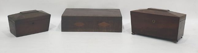 Early 19th century mahogany tea caddy of sarcophagus-design, the interior fitted with two caddies