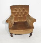 Late Victorian low armchair in a brown button-back
