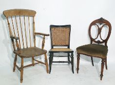 Elm seated stickback chair with turned supports and stretcher, a cane-backed and seated ebonised