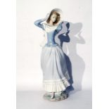 Lladro figure 'Spring Breeze' of a girl holding he