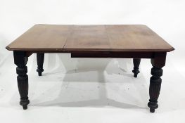 Victorian mahogany extending dining table, the rectangular top with moulded edge and canted corners,