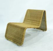 Low wicker garden chair