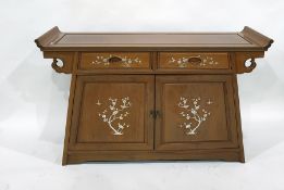 20th century Chinese sideboard with mother-of-pearl inlaid drawer and door fronts, raised on a