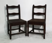 Four oak bar-back chairs and a Norfolk chair in th