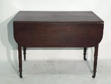 19th century mahogany Pembroke table on reeded supports, to castors