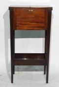 19th century mahogany workbox, the fold-out lidded top enclosing compartmented interior, fold-out