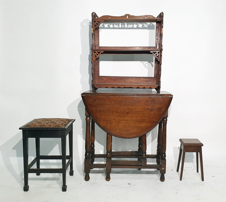 20th century oak gateleg dining table, a wall hanging shelving unit, a stool with upholstered seat