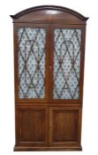 19th century mahogany arched top bookcase with diamond inlay to arch, above the two astragal-