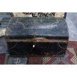 Black leather dome-top brass studded trunk bearing