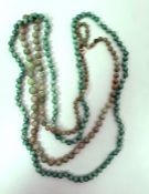 Graduated jade bead necklace and a green glass bead necklace (2)