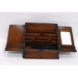 Late 19th/early 20th century oak table-top stationery cabinet, the hinged doors revealing letter