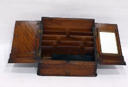 Late 19th/early 20th century oak table-top stationery cabinet, the hinged doors revealing letter