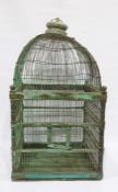 Wire and wooden birdcage with domed top and having turned corners, painted in turquoise, 90cm high