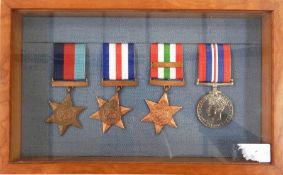 WWII group of four in mahogany case,WWI war medal and Victory medal named to " 32782 Pte. W