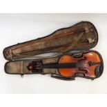 Half-size violin in case, bearing paper label to interior, with three bows and another small