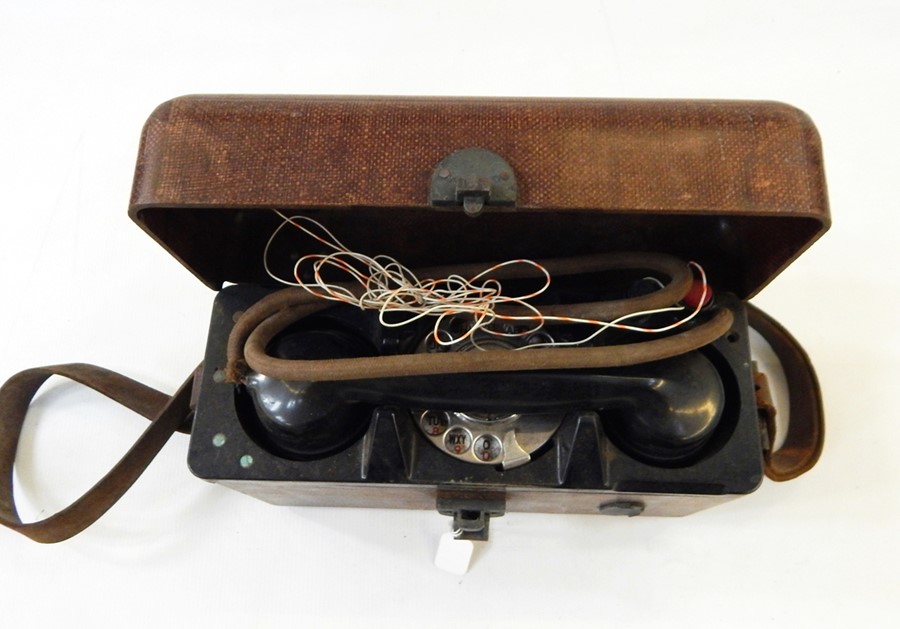 Vintage portable telephone in case
