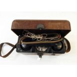 Vintage portable telephone in case