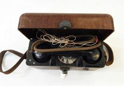 Vintage portable telephone in case