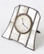 Early 20th century white metal and mother-of-pearl clock with Arabic numerals to the dial, Swiss-