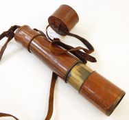 Brass and brown leather cased three-draw telescope