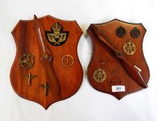 Mahogany shield plaque with applied carved propeller blade, the plaque mounted with brass PTI arm
