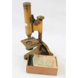 R & J Beck of London brass microscope and slides