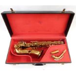 Brass saxophone in case, made by Elkhart