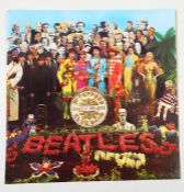 Box of vinyl records to include The Who 'Who's Next', an empty sleeve of The Beatles 'Sgt. Pepper'