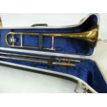 Trombone by Boosey & Hawkes, in fitted case with music stand, mute and accessories