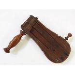 Early 19th century mahogany bird scarer inscribed in pen to the back 'purchased 30th March 1807'