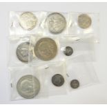 Box of coins including 1819 crown, 1889 double florin, 1825 half crown, 1711 shilling plus some