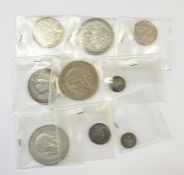 Box of coins including 1819 crown, 1889 double florin, 1825 half crown, 1711 shilling plus some