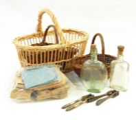 Box of miscellaneous assorted items to include place mats, glass bottles, ashtray, horse brasses,