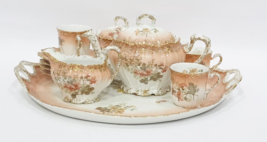 Limoges cabaret set decorated with geraniums on a