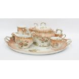 Limoges cabaret set decorated with geraniums on a