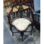 Mahogany framed corner chair with serpentine fronted seat, on cabriole supports, carved and