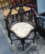 Mahogany framed corner chair with serpentine fronted seat, on cabriole supports, carved and