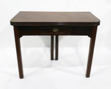 19th century mahogany fold-over tea table with single drawer, raised upon moulded legs, 95cm x 74.