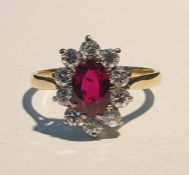 Yellow and white gold, ruby and diamond cluster ri
